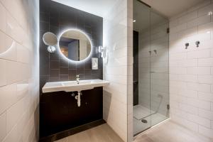 Kylpyhuone majoituspaikassa Cityden Stadshart