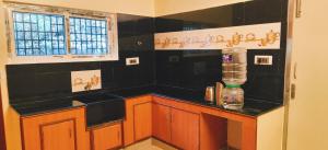 Kuchyň nebo kuchyňský kout v ubytování Black Pepper Cottage Yercaud