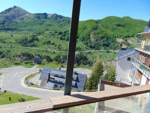 a view from a balcony of a building with a mountain at Apartamento Bal De Tena in Formigal