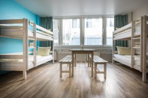 Postel nebo postele na pokoji v ubytování Wombat's City Hostel Munich Hauptbahnhof + 37 fotografií