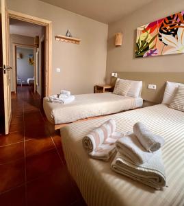 Posteľ alebo postele v izbe v ubytovaní GMHouse Minorca GMH