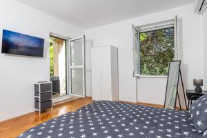 Postel nebo postele na pokoji v ubytování Placa apartment