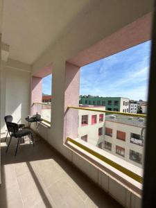 Un balcón o terraza de City Haven Tirana