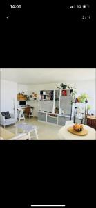 Η κουζίνα ή μικρή κουζίνα στο Chambre artistique en colocation entre Disneyland et Paris