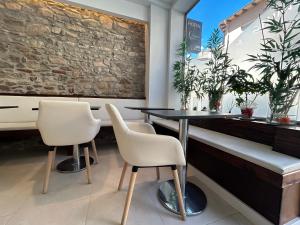 Posedenie v ubytovaní Hostal Somnis