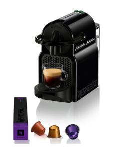 a black coffee maker with a cup of coffee at Notos Premium Holiday Apartments in Pefkohori