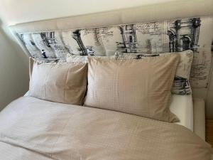 Llit o llits en una habitació de Apartman Ares