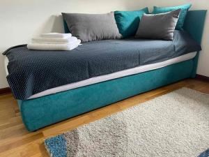 Llit o llits en una habitació de Apartman Ares