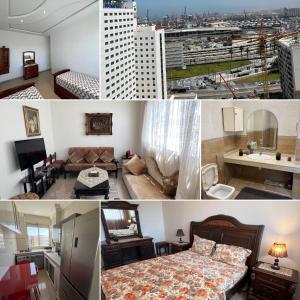 um quarto de hotel com uma cama e vista para a cidade em 16e Étage : Confort & Vue em Casablanca