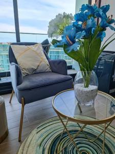 Posezení v ubytování HOM I Frente al Mall I Confort total I Studio I Wifi PNB 1817