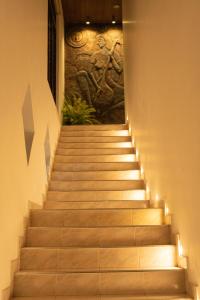 a set of stairs with lights on them at B&B Shenal Villa Kosgoda in Kosgoda