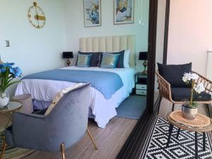 Postel nebo postele na pokoji v ubytování HOM I Frente al Mall I Confort total I Studio I Wifi PNB 1817