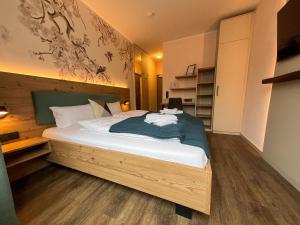 Postel nebo postele na pokoji v ubytování Café-Hotel Gutshof