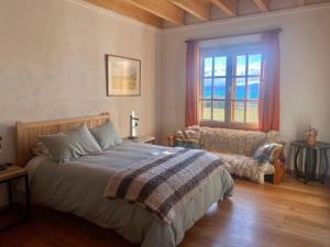 Postel nebo postele na pokoji v ubytování Top 1 Casa de Campo Lago General Carrera Guadal