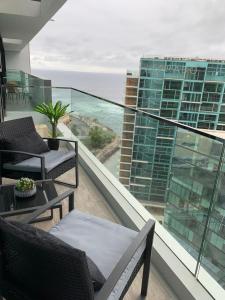 O zonă de relaxare la HOM I Inigualable depto 2D2B con Vista al Mar 0917
