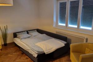 Voodi või voodid majutusasutuse Living (82 m²) in the heart of Graz toas