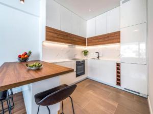 Kuchyň nebo kuchyňský kout v ubytování Apartment Lara Exclusive