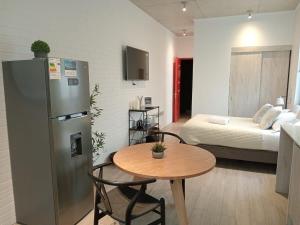 En eller flere senge i et værelse på HOM I Espectacular Estudio a Estrenar en Valparaíso 2PAX 2111