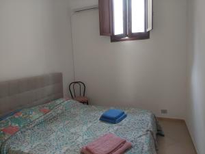 Säng eller sängar i ett rum på Casa di Jibran
