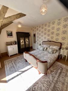 Ένα ή περισσότερα κρεβάτια σε δωμάτιο στο Attic Suite, Maison de Mags & Mags +12 φωτογραφίες