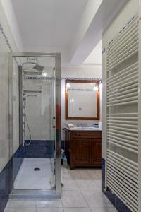 a bathroom with a shower and a sink at Albergo La Marina B&B in Deiva Marina