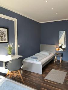 Postel nebo postele na pokoji v ubytování Blue Doors Hostel Altstadt