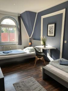Postel nebo postele na pokoji v ubytování Blue Doors Hostel Altstadt