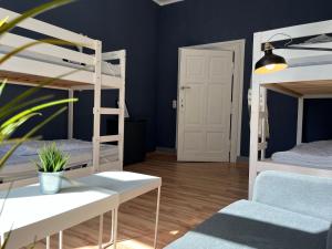 Postel nebo postele na pokoji v ubytování Blue Doors Hostel Altstadt