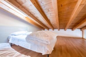Postel nebo postele na pokoji v ubytování Residence Tatiana B3