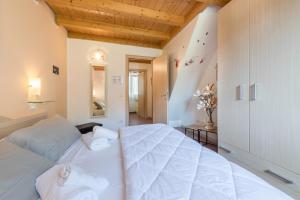 Postel nebo postele na pokoji v ubytování Residence Tatiana B3