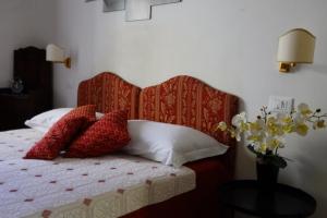 Postel nebo postele na pokoji v ubytování B&B Myosotis