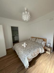 Ένα ή περισσότερα κρεβάτια σε δωμάτιο στο Apartamento Oasis Mediterráneo