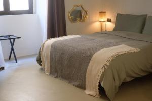 Letto o letti in una camera di Pause Suite