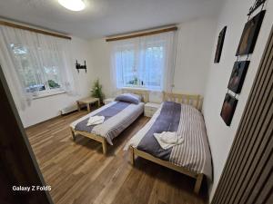 Voodi või voodid majutusasutuse Pension DonauBlick Grein 1 , Spitzfeldstr 1 toas
