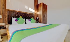 Postel nebo postele na pokoji v ubytování Hotel Green Woods