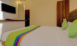 Postel nebo postele na pokoji v ubytování Hotel Green Woods