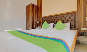 Postel nebo postele na pokoji v ubytování Hotel Green Woods