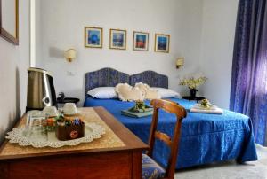 Postel nebo postele na pokoji v ubytování B&B Myosotis
