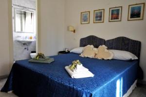 Postel nebo postele na pokoji v ubytování B&B Myosotis