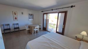 Postel nebo postele na pokoji v ubytování Mediterrània 21