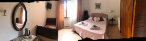 Postel nebo postele na pokoji v ubytování B&B Myosotis