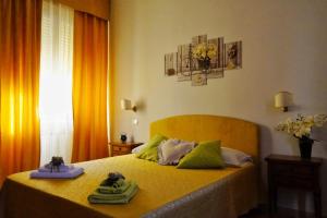 Postel nebo postele na pokoji v ubytování B&B Myosotis