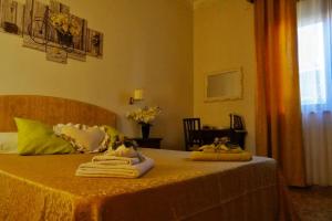 Postel nebo postele na pokoji v ubytování B&B Myosotis