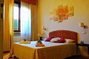 Postel nebo postele na pokoji v ubytování B&B Myosotis