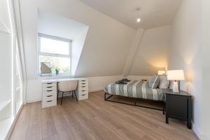 Ein Bett oder Betten in einem Zimmer der Unterkunft Contemporary 2 Bed Apartment Solihull NEC BHX