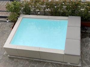 a large swimming pool sitting on the ground at Extra Comfort - Casa Vicino a Milano e Linate in Zelo Buon Persico