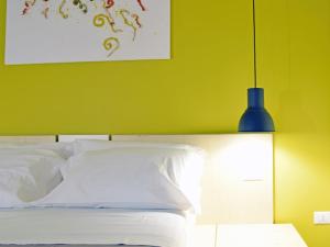 Postel nebo postele na pokoji v ubytování Bio Hotel Palermo