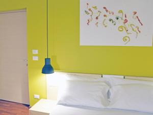 Postel nebo postele na pokoji v ubytování Bio Hotel Palermo