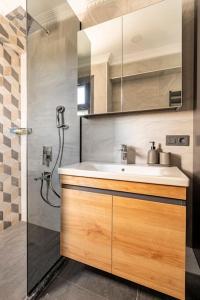 a bathroom with a sink and a shower at Tomtom HOUSE Centre Location in Istanbul +38 photos