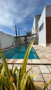 a swimming pool in the backyard of a building at Casa Olinda in Olinda